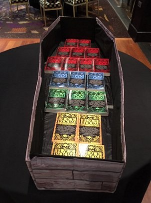 Coffin display of all four Black Room Manuscripts volumes
