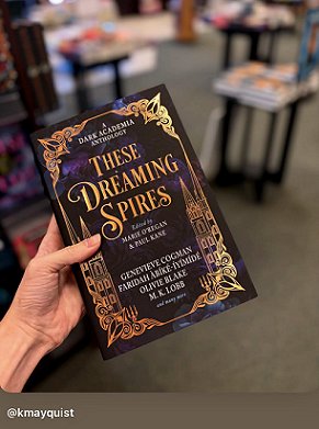 photograph of a hand holding a copy of These Dreaming Spires, edited by Marie O'Regan and Paul Kane