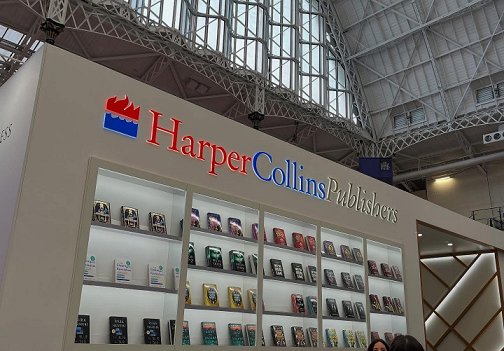 photograph howing the HarperCollins stand book display and sign