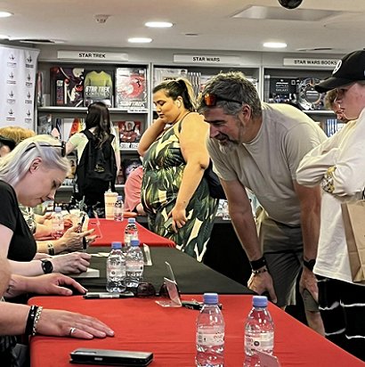 Alexandra Benedict signing copies of The Other Side of Never, edited by Marie O'Regan and Paul Kane