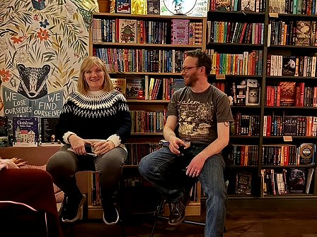 L to R: A smiling Marie O'Regan and Mark A. Latham