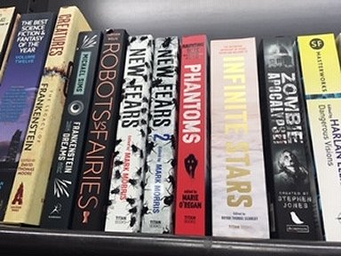 Bookshelf including copies of Phantoms, edited by Marie O'Regan