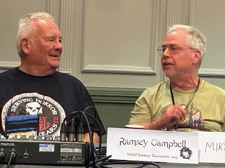 L to R: A smiling Ramsey Campbell and Mike Chinn on the '50 Years of FantasyCon Happy Birthday panel'