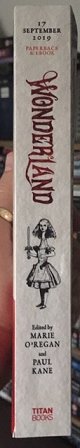 illustrated spine of Wonderland, edited by Marie O'Regan and Paul Kane